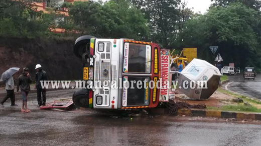 Lorry flips 